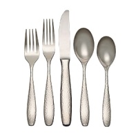 Lightly hammered handles and a gleaming mirror finish gives this Reed & Barton flatware set a warm, versatile appearance.