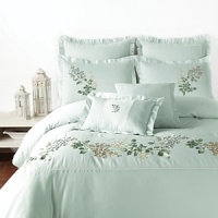 A delicate floral border adds classic charm to this duvet set, featuring two shams, two decorative pillows and a lushly flowing bedskirt. A delicate floral border adds classic charm to this duvet set, featuring two shams, two decorative pillows and a lushly flowing bedskirt.