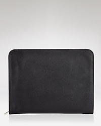 Upgrade your on-the-go essentials with this sleeve from Longchamp. Crafted from luxurious leather, it's a simple style that plays off the label's practical-chic. Upgrade your on-the-go essentials with this sleeve from Longchamp. Crafted from luxurious leather, it's a simple style that plays off the label's practical-chic.