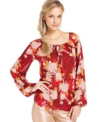 Perfect for adding a bright splash of color to your cold-weather wardrobe, this bold floral-print Lucky Brand Jeans top feminizes the season's denim! Perfect for adding a bright splash of color to your cold-weather wardrobe, this bold floral-print Lucky Brand Jeans top feminizes the season's denim!