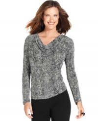 A chic graphic print and figure-flattering ruching makes this petite top from Jones New York Signature a brilliant find! A chic graphic print and figure-flattering ruching makes this petite top from Jones New York Signature a brilliant find!