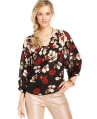 Add a pop of personality to your fall look with this graphic-floral Lucky Brand Jeans top -- perfectly paired with denim! Add a pop of personality to your fall look with this graphic-floral Lucky Brand Jeans top -- perfectly paired with denim!