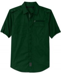 A short-sleeved utility shirt with the full-on complement of pockets, epaulets, zippers, buttons, and grommets in full-on Sean John style. A short-sleeved utility shirt with the full-on complement of pockets, epaulets, zippers, buttons, and grommets in full-on Sean John style.