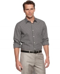 Pattern your workweek look with the simple style of a plaid woven shirt from Perry Ellis. Pattern your workweek look with the simple style of a plaid woven shirt from Perry Ellis.