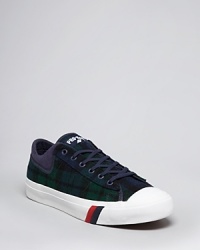 A sporty sneaker in Blackwatch plaid spruces up your casual cool attire with pattern and color. A sporty sneaker in Blackwatch plaid spruces up your casual cool attire with pattern and color.
