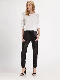 Leather is so chic and so on trend this season. These jogging pants are made from buttery Italian leather and represent both luxury and athletic style.Drawstring waistSlash pocketsElasticized waist and cuffsInseam, about 28Lambskin leatherDry clean by leather specialistImported of Italian fabric Model shown is 5'9 (175cm) wearing US size Small. Leather is so chic and so on trend this season. These jogging pants are made from buttery Italian leather and represent both luxury and athletic style.Drawstring waistSlash pocketsElasticized waist and cuffsInseam, about 28Lambskin leatherDry clean by leather specialistImported of Italian fabric Model shown is 5'9 (175cm) wearing US size Small.