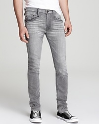 These unique jeans mesh with your authentic style, faded and distressed throughout for a masculine edge. From True Religion. These unique jeans mesh with your authentic style, faded and distressed throughout for a masculine edge. From True Religion.