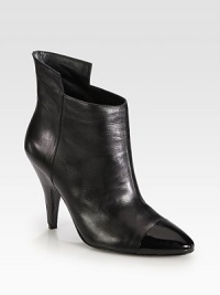 An elevated architectural design of sumptuous leather, topped with a patent cap toe and trim. Leather-covered heel with patent leather trim, 4¼ (110mm)Leather and patent leather upperLeather lining and solePadded insoleImported An elevated architectural design of sumptuous leather, topped with a patent cap toe and trim. Leather-covered heel with patent leather trim, 4¼ (110mm)Leather and patent leather upperLeather lining and solePadded insoleImported