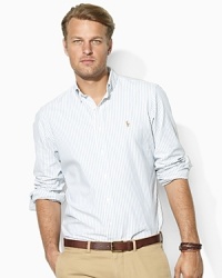 Vibrant and handsome bengal stripes make a sharp statement on a classic-fitting sport shirt in lightweight oxford-woven cotton. Vibrant and handsome bengal stripes make a sharp statement on a classic-fitting sport shirt in lightweight oxford-woven cotton.