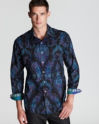 A vivid paisley pattern button-down energizes your look and gets the right kind of attention wherever you go. Pair with dark wash jeans or dress pants for a striking ensemble. A vivid paisley pattern button-down energizes your look and gets the right kind of attention wherever you go. Pair with dark wash jeans or dress pants for a striking ensemble.
