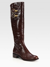 Rich crocodile-print leather forms this powerful silhouette, topped with sophisticated buttons. Stacked heel, 1½ (40mm)Shaft, 17½Leg circumference, 14½Crocodile-print leather upper with self-covered goldtone trim buttonsSide zipLeather lining and solePadded insoleImported Rich crocodile-print leather forms this powerful silhouette, topped with sophisticated buttons. Stacked heel, 1½ (40mm)Shaft, 17½Leg circumference, 14½Crocodile-print leather upper with self-covered goldtone trim buttonsSide zipLeather lining and solePadded insoleImported