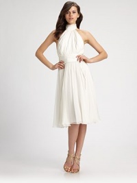 This romantic silk design boasts a halter neckline and an alluring flutter back.Halter necklineGathered bodiceBanded waistGathered skirtOpen back with flutter drape detailFully linedAbout 29 from natural waistSilkImportedModel shown is 5'10 (177cm) wearing US size 4.OUR FIT MODEL RECOMMENDS ordering true size. This romantic silk design boasts a halter neckline and an alluring flutter back.Halter necklineGathered bodiceBanded waistGathered skirtOpen back with flutter drape detailFully linedAbout 29 from natural waistSilkImportedModel shown is 5'10 (177cm) wearing US size 4.OUR FIT MODEL RECOMMENDS ordering true size.