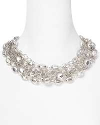 Update and embolden every outfit with this layered beaded bib necklace from RJ Graziano, accented by a dramatic collar of chains and resin beads. Update and embolden every outfit with this layered beaded bib necklace from RJ Graziano, accented by a dramatic collar of chains and resin beads.