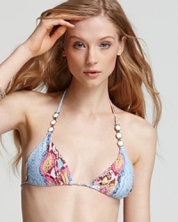 Take your penchant for prints to the beach with PilyQ's printed bikini top. In a cute color way, this piece is snake charming with the matching bottom and your favorite shades.