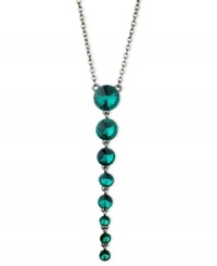 Teal appeal. This Y-shaped necklace from GUESS is crafted from hematite-tone mixed metal with glass crystal stones putting on a dazzling display. Item comes packaged in a signature GUESS Gift Box. Approximate length: 18 inches + 2-inch extender. Approximate drop: 4 inches.