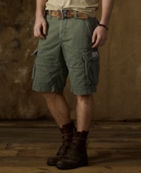 Crafted from faded and frayed cotton chino twill, a classic cargo short looks right at home in the urban jungle with its rugged safari style and utility details.