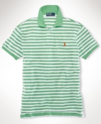 A relaxed-fitting short-sleeved polo shirt is crafted from breathable cotton mesh with sleek stripes for a handsome, modern look A relaxed-fitting short-sleeved polo shirt is crafted from breathable cotton mesh with sleek stripes for a handsome, modern look