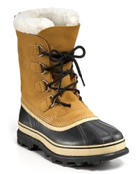 This rugged all-weather boot from Sorel keeps you warm and dry under any conditions, with a rubber shell toe and sides, waterproof leather upper and cozy sherpa cuff. This rugged all-weather boot from Sorel keeps you warm and dry under any conditions, with a rubber shell toe and sides, waterproof leather upper and cozy sherpa cuff.
