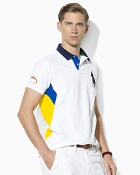 Ralph Lauren's official limited edition US Open polo shirt is crafted from moisture-wicking piqué in a trim-fitting, color-blocked design. Ralph Lauren's official limited edition US Open polo shirt is crafted from moisture-wicking piqué in a trim-fitting, color-blocked design.