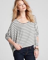 Master laid-back chic with Red Haute's striped, poncho-shaped top, the perfect way to top off jeans and slip-on sneakers. Master laid-back chic with Red Haute's striped, poncho-shaped top, the perfect way to top off jeans and slip-on sneakers.