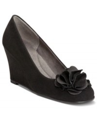 Let the tide of sophistication sweep over your feet. Aerosoles' Plumbrella wedges feature a pretty flower accent at the toe and a cushioned footbed for maximum comfort. Let the tide of sophistication sweep over your feet. Aerosoles' Plumbrella wedges feature a pretty flower accent at the toe and a cushioned footbed for maximum comfort.