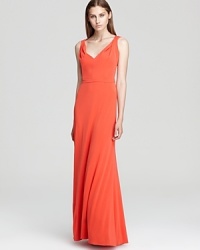 An open, crisscross back offers an unexpected finish on Issa London's vibrant v neck dress. An open, crisscross back offers an unexpected finish on Issa London's vibrant v neck dress.