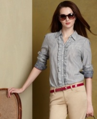 Strike a feminine note in Tommy Hilfiger's striped button-down shirt, complete with crisp ruffled trim at the placket. Strike a feminine note in Tommy Hilfiger's striped button-down shirt, complete with crisp ruffled trim at the placket.
