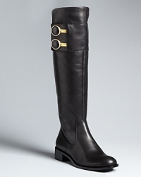 Flat-out fashionable, these tall boots by Rachel Zoe feature eye-catching, luxe golden button details on each shaft that make these standbys stand out. Flat-out fashionable, these tall boots by Rachel Zoe feature eye-catching, luxe golden button details on each shaft that make these standbys stand out.