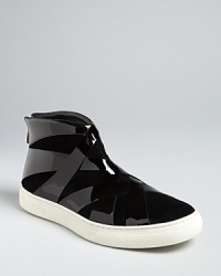 Dress to thrill in these high top Alejandro Ingelmo sneakers. They're slickly on top of the athletic-meets-fashion trend with patently fantastic, strappy details. Dress to thrill in these high top Alejandro Ingelmo sneakers. They're slickly on top of the athletic-meets-fashion trend with patently fantastic, strappy details.