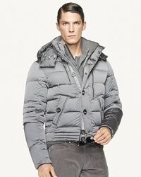 Exuding modern appeal in a trim-fitting silhouette, the Metropolis coat exquisitely defies the elements in lustrous nylon with a plush down filling. Exuding modern appeal in a trim-fitting silhouette, the Metropolis coat exquisitely defies the elements in lustrous nylon with a plush down filling.