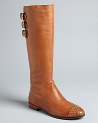 Range far and wide in walkable, stylish riding boots from designer Rebecca Minkoff. They'll take you to your destination in style, with studded cap toes that set the look apart. Range far and wide in walkable, stylish riding boots from designer Rebecca Minkoff. They'll take you to your destination in style, with studded cap toes that set the look apart.