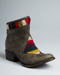 Get into Southwestern style in these low-key FREEBIRD by Steven booties. Mixed-media blanket-patterned textile and leather uppers give them a distinctive look among the Western set. Get into Southwestern style in these low-key FREEBIRD by Steven booties. Mixed-media blanket-patterned textile and leather uppers give them a distinctive look among the Western set.