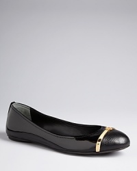 Tory Burch takes stylish cap toe flats to the next level of fashion, with bold metal bar logos defining the Pacey design. Tory Burch takes stylish cap toe flats to the next level of fashion, with bold metal bar logos defining the Pacey design.