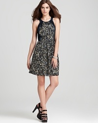 Well-structured with a feminine silhouette and lively sequin print, this Rebecca Taylor dress offers an alluring point of view from front to racerback. Well-structured with a feminine silhouette and lively sequin print, this Rebecca Taylor dress offers an alluring point of view from front to racerback.
