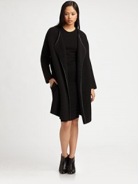 Oversized and trimmed in lustrous leather, this elegant wool and yak staple has an open front and convenient slash pockets. Open frontLong sleevesSlash pocketsAbout 39 from shoulder to hem50% wool/50% yak with leather trimDry cleanMade in USA of imported fabricModel shown is 5'10 (177cm) wearing US size Small. Oversized and trimmed in lustrous leather, this elegant wool and yak staple has an open front and convenient slash pockets. Open frontLong sleevesSlash pocketsAbout 39 from shoulder to hem50% wool/50% yak with leather trimDry cleanMade in USA of imported fabricModel shown is 5'10 (177cm) wearing US size Small.