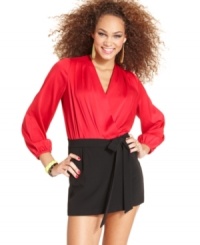 Serve up sass plus class in this skorts romper from XOXO. Long sleeves make the one-piece perfect for autumn nights, while the colorblock design and chic wrap-style totally makes us swoon. Serve up sass plus class in this skorts romper from XOXO. Long sleeves make the one-piece perfect for autumn nights, while the colorblock design and chic wrap-style totally makes us swoon.