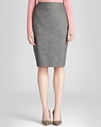 Classic fall essentials include this smooth, slim-fitting REISS pencil skirt that makes a seamless transition to the next season. Team it with a voluminous shirt in the season's jewel-tone shades.