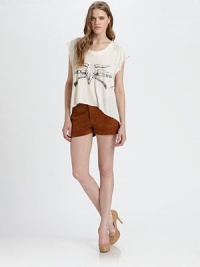 Lightweight, cool-girl basic has cap sleeves, an asymmetrical hem and a western-inspired longhorn print. RoundneckCap sleevesAsymmetrical cropped front hem50% modal/50% cottonDry cleanMade in USAModel shown is 5'10 (177cm) wearing US size Small. Lightweight, cool-girl basic has cap sleeves, an asymmetrical hem and a western-inspired longhorn print. RoundneckCap sleevesAsymmetrical cropped front hem50% modal/50% cottonDry cleanMade in USAModel shown is 5'10 (177cm) wearing US size Small.