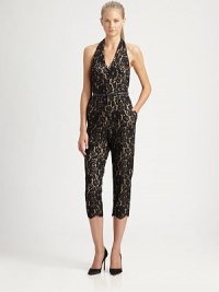 Delicate lace offers a ladylike take on the classic jumpsuit, finished with a chic halter neckline and belted waist.Halter necklineTop-fit bodiceBelted waistAnkle zippersCenter back zipperAbout 50 from shoulder to hem59% nylon/41% cottonDry cleanImportedModel shown is 5'11 (180cm) wearing US size 4. Delicate lace offers a ladylike take on the classic jumpsuit, finished with a chic halter neckline and belted waist.Halter necklineTop-fit bodiceBelted waistAnkle zippersCenter back zipperAbout 50 from shoulder to hem59% nylon/41% cottonDry cleanImportedModel shown is 5'11 (180cm) wearing US size 4.
