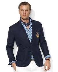 Tailored in Italy from a luxuriously lightweight cotton-linen blend, a modern three-button sport coat is emboldened with country embroidery for authentic style and time-honored tradition. Tailored in Italy from a luxuriously lightweight cotton-linen blend, a modern three-button sport coat is emboldened with country embroidery for authentic style and time-honored tradition.