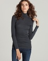 Super comfortable and a perfect addition to any wardrobe, this chic turtleneck is rendered in a luxuriously soft blend of Supima cotton and modal. Wear with leggings or skinny jeans for a streamlined silhouette.