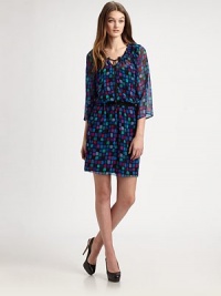 Sheer geometrically printed chiffon, in a pull-on style accented with a prettily gathered drawstring neckline.Gathered jewel neckline with drawstring tieThree-quarter sleevesElastic waistbandFully linedAbout 21 from natural waistPolyesterDry cleanImportedModel shown is 5'10 (177cm) wearing US size 4. Sheer geometrically printed chiffon, in a pull-on style accented with a prettily gathered drawstring neckline.Gathered jewel neckline with drawstring tieThree-quarter sleevesElastic waistbandFully linedAbout 21 from natural waistPolyesterDry cleanImportedModel shown is 5'10 (177cm) wearing US size 4.