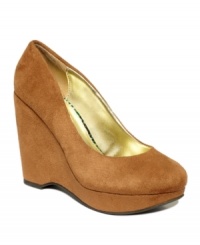 Plenty of height in a style that's easy to walk in. Rampage's Ladarius platform wedges have a smooth round toe and a covered platform and heel. Plenty of height in a style that's easy to walk in. Rampage's Ladarius platform wedges have a smooth round toe and a covered platform and heel.