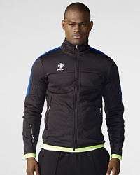 Sleek microfleece lends athletic style and lightweight comfort to a sporty track jacket, finished with pops of neon and race-inspired graphics. Sleek microfleece lends athletic style and lightweight comfort to a sporty track jacket, finished with pops of neon and race-inspired graphics.