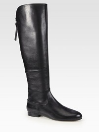 An exposed back zip adds tough-luxe style to this modern leather boot with a stacked heel. Shaft, 18Leg circumference, 14Leather upperExposed back zipLeather lining and solePadded insoleImported An exposed back zip adds tough-luxe style to this modern leather boot with a stacked heel. Shaft, 18Leg circumference, 14Leather upperExposed back zipLeather lining and solePadded insoleImported