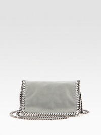 A sleek foldover silhouette of faux leather, finished with polished chain trim.Chain strap, 19 dropFlap snap closureOne inside open pocketNylon logo lining8½W X 5H X 2DFaux leatherMade in Italy A sleek foldover silhouette of faux leather, finished with polished chain trim.Chain strap, 19 dropFlap snap closureOne inside open pocketNylon logo lining8½W X 5H X 2DFaux leatherMade in Italy