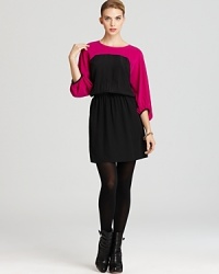 A bold color blocked pop of pink revs up this sophisticated Tegan dress crafted from pure silk. A bold color blocked pop of pink revs up this sophisticated Tegan dress crafted from pure silk.