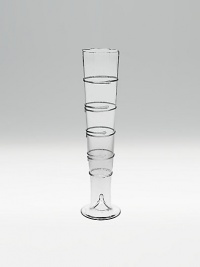 Expertly-crafted with a raised spiral design and an uncanny resemblance to a champagne flute. Mouthblown glass 15 high 38-ounce capacity Handmade Imported