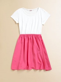 A flirty full skirt is attached to a basic white knit creating a classic two-piece look in one A-line frock.ScoopneckShort sleevesPullover styleElastic waistband50% cotton/50% micro modalMachine washMade in USA A flirty full skirt is attached to a basic white knit creating a classic two-piece look in one A-line frock.ScoopneckShort sleevesPullover styleElastic waistband50% cotton/50% micro modalMachine washMade in USA