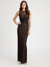 Utter romance: three types of strategically tailored lace make up this floor-length design.Scalloped jewel necklineSleevelessBodice pleatsBack slitConcealed back zipFully linedAbout 44 from natural waist52% nylon/48% rayonDry cleanImportedModel shown is 5'11 (180cm) wearing US size 4. Utter romance: three types of strategically tailored lace make up this floor-length design.Scalloped jewel necklineSleevelessBodice pleatsBack slitConcealed back zipFully linedAbout 44 from natural waist52% nylon/48% rayonDry cleanImportedModel shown is 5'11 (180cm) wearing US size 4.